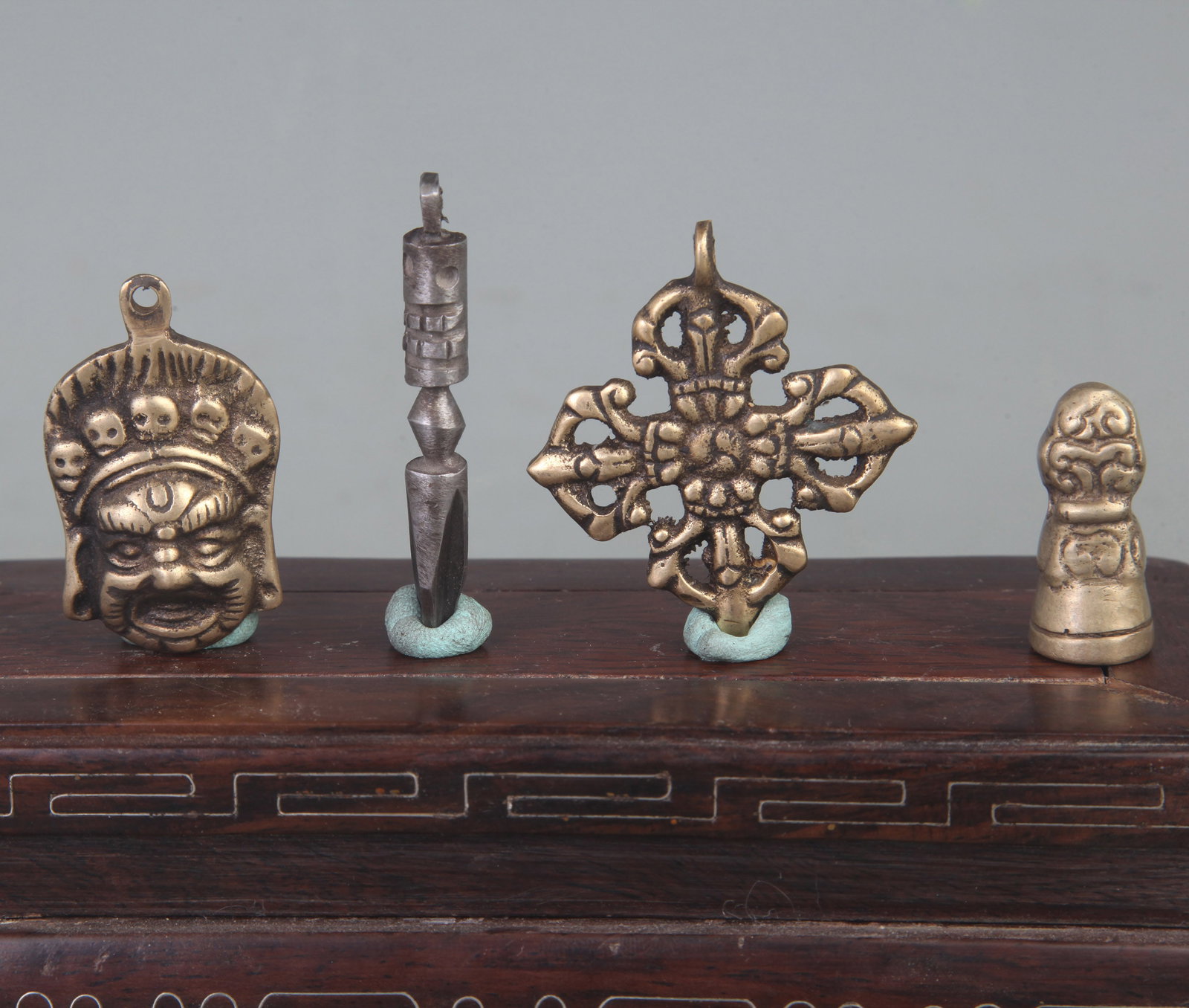 GROUP OF TIBETAN BUDDHISM INSTRUMENTS PHURBA: 20th Century; Long: 2.2-1.3 inch; wooden base for picture and display purpose only.
