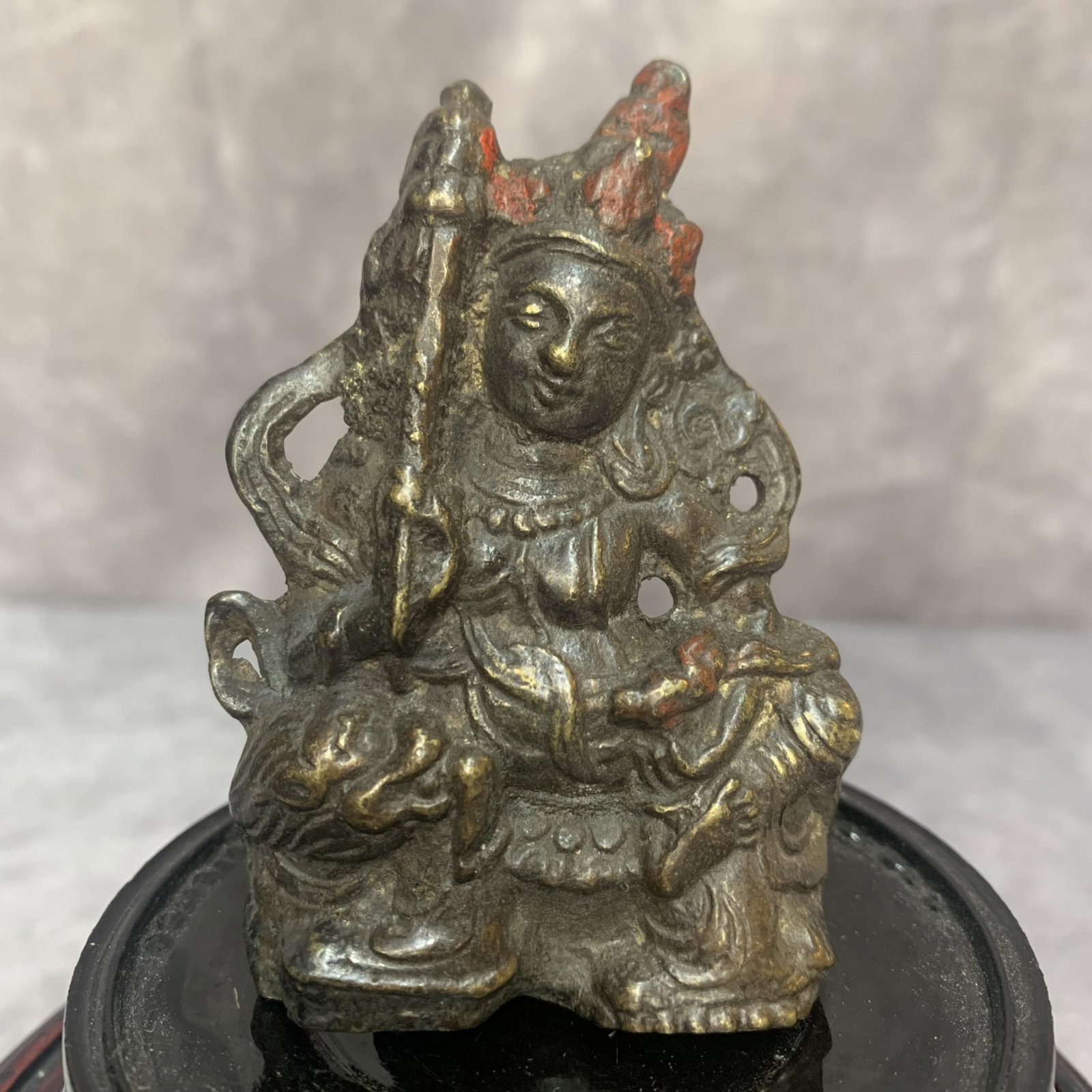 A FINE SMALL BRONZE TIBETAN PENDANT: Qing Dynasty; High:7.9 inch; Width: 1.9 inch; wooden base for picture and display purpose only.