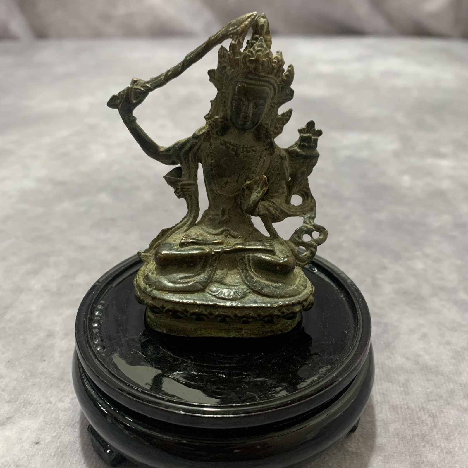 A FINE SMALL TIBETAN BUDDHIST STATUES: 19th Century; Long: 1.8 inch; Width: 3.2 inch; wooden base for picture and display purpose only.