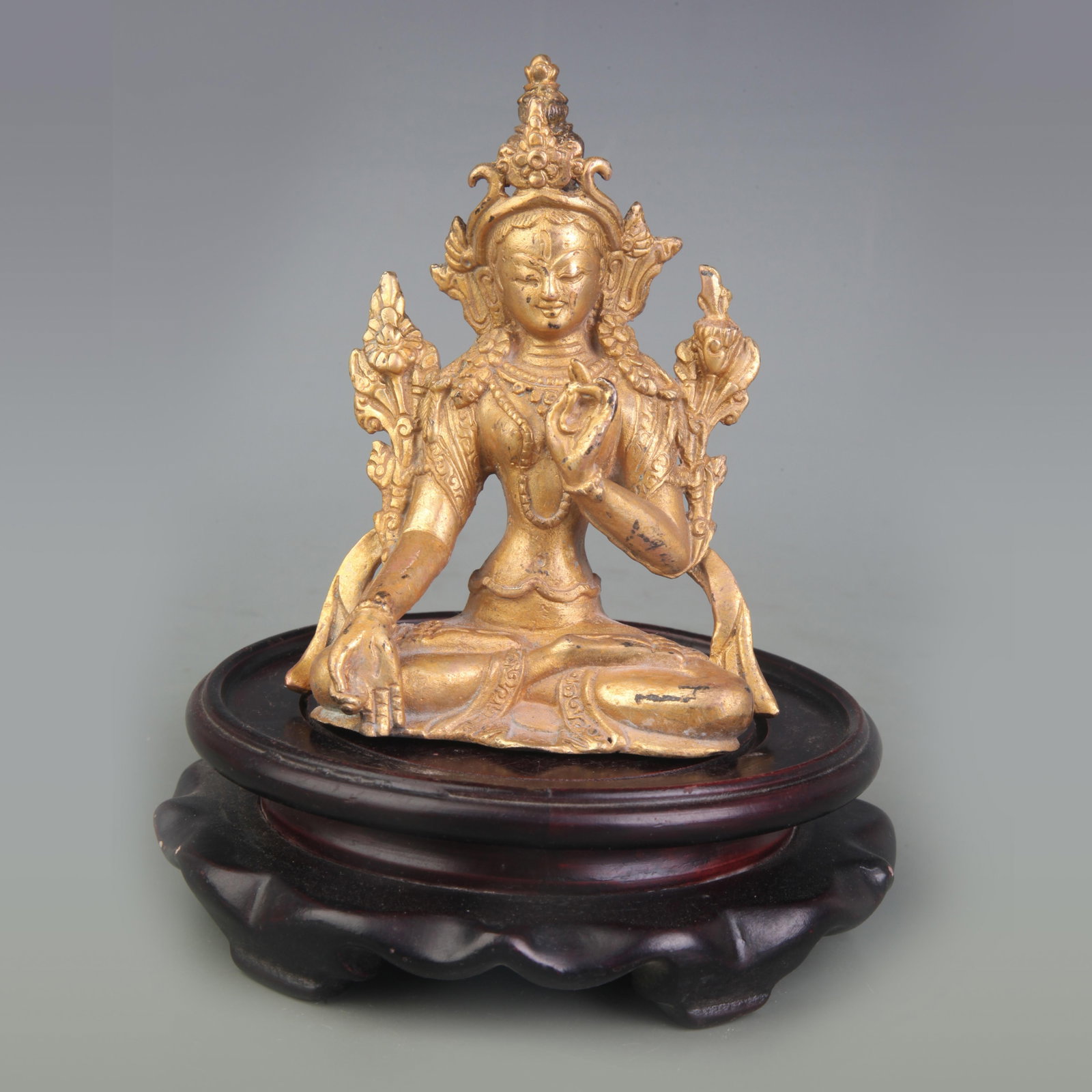 A FINE SMALL BRONZE WHITE TARA FIGURE: Qing Dynasty; High: 4.5 inch;; wooden base for picture and display purpose only.