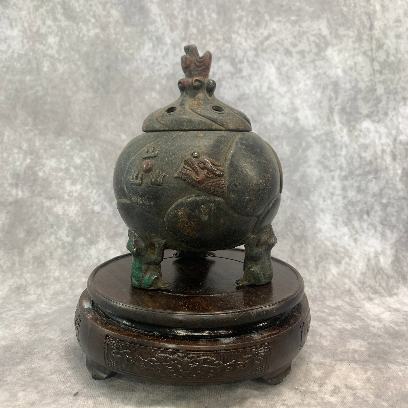A CHINESE POLYCHROME AND PATINATED BRONZE 'DRAGON AND PHOENIX' FIGURAL TRIPOD INCENSE BURNER AND: Republic Period; High: 6.3 inch; Diameter: 4.7 inch; wooden base for picture and display purpose only.