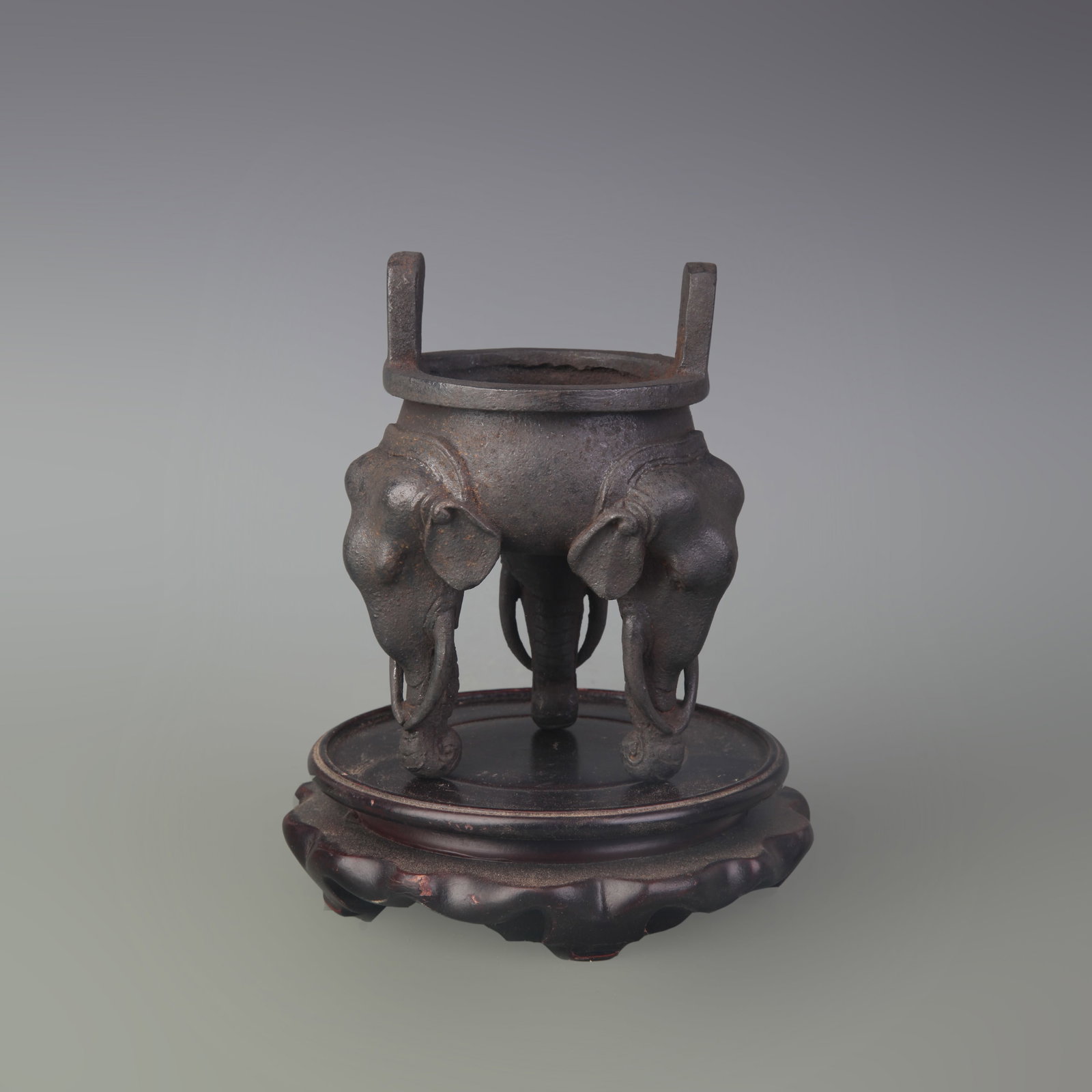 CAST IRON CENSER WITH ELEPHANT FEET: Qing Dynasty; Width: 4.0 inch; High: 5.2 inch; wooden base for picture and display purpose only.