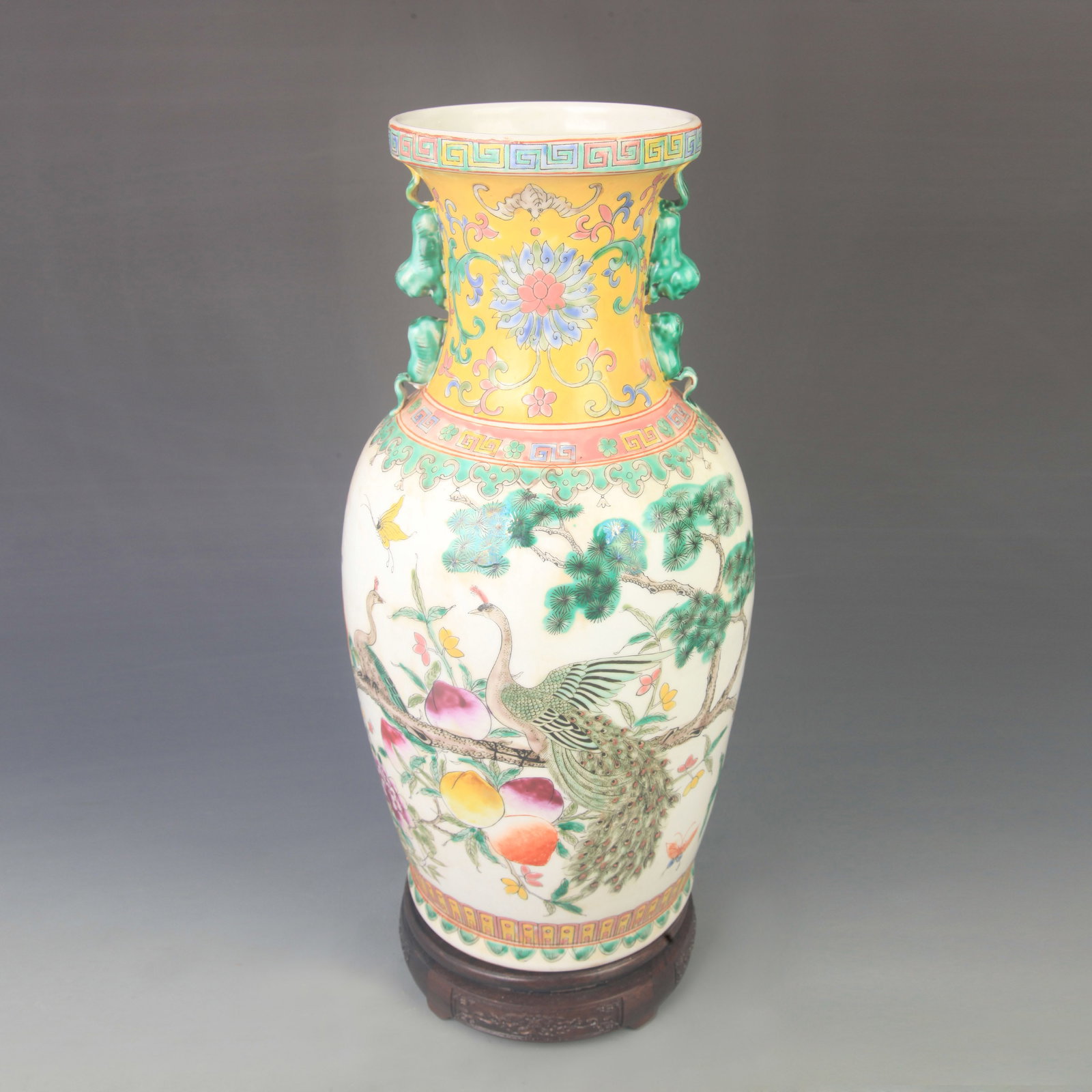 A FAMILLE ROSE FLOWER PATTERN PORCELAIN VASE: Qing Dynasty Kang Xi Period High: 16.0 inch; Diameter: 7.50 inch; wooden base for picture and display purpose only.