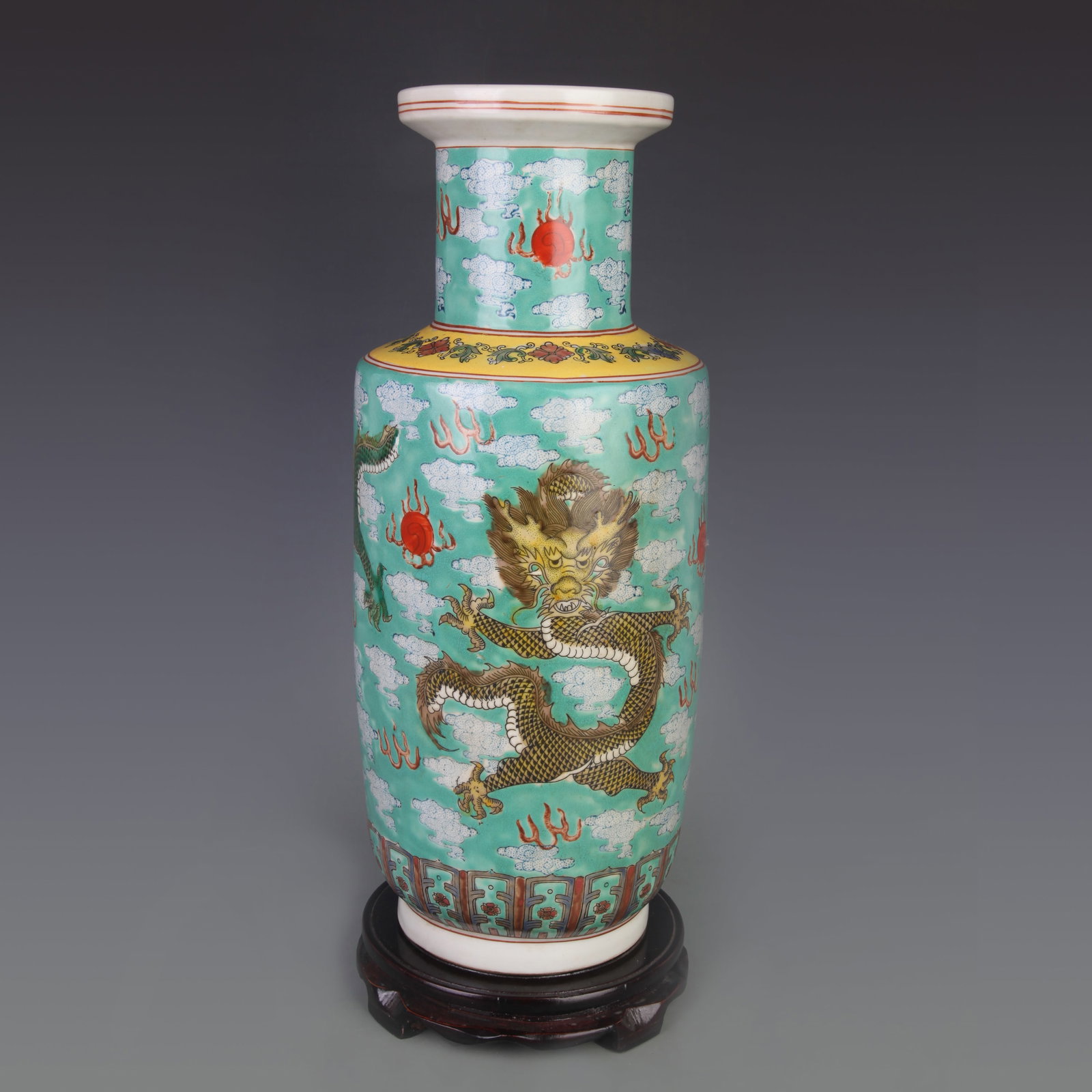 FAMILLE ROSE GREEN-GROUND PORCELAIN VASE WITH DRAGON MOTIF: Qing Dynasty Kang Xi Period; Diameter: 7.5 inch, High: 16.6 inch; wooden base for picture and display purpose only.