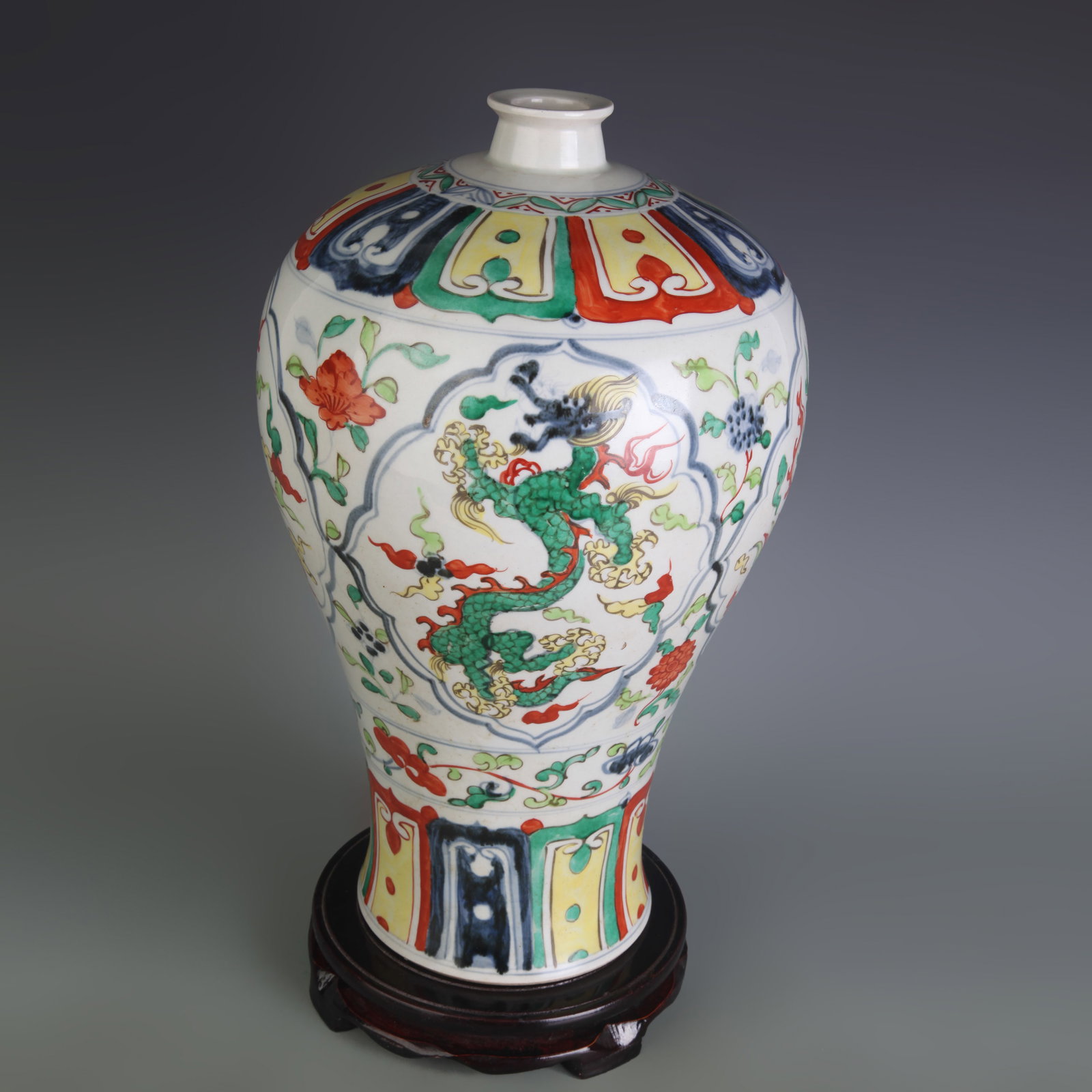 A WUCAI DRAGON AND PHOENIX MEIPING STYLE PORCELAIN VASE: Ming Dynasty Xuan De Style; Diameter: 5.5 inch; High: 14.1 inch; wooden base for picture and display purpose only.