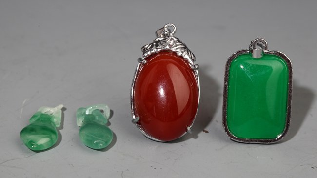 A GROUP OF THREE PENDANT, JADEITE AND ZIRCON: 20th Century, L:1.00 in×1.5 in