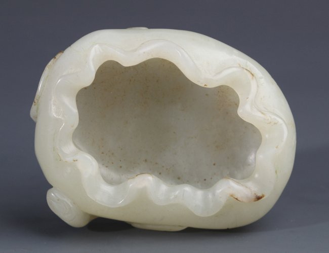 A LOTUS LEAF LIKE WHITE JADE BRUSH WASHER: Qing Dynasty, W:2.99 in×H:0.94 in