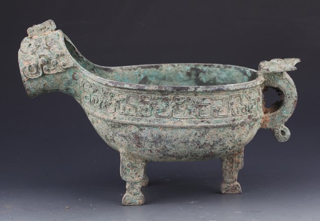 A BRONZE COPY OF ANIMAL SHAPE WATER POT: Western Zhou Dynasty, H:5.1 in×W:10.2 in