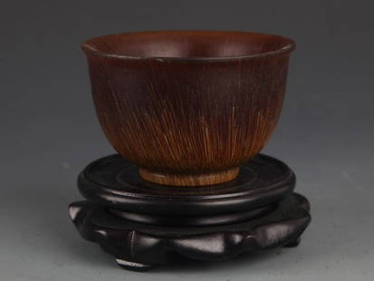 A CARVED HORN CUP: H:2.25 in×W:3.75 in