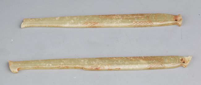 A GROUP OF TWO FISH SHAPE HETIAN GREENISH WHITE JADE: Shang Dynasty,L:3.9 in×4.3 in