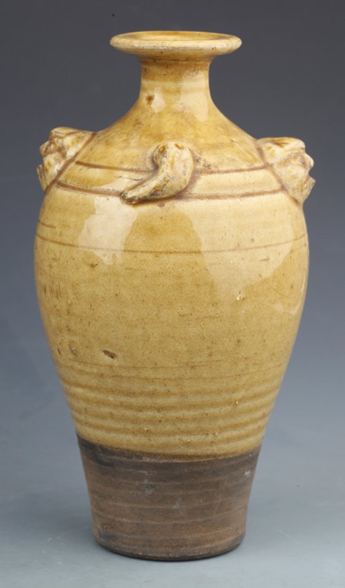 A FINE YAO ZHOU YAO, YELLOW COLOR PORCELAIN BOTTLE: Jin Dynasty, H:8.00 in