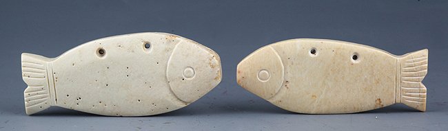 A PAIR OF JADE FISH: Shang Dynasty, L:2.5in × W:1.0in