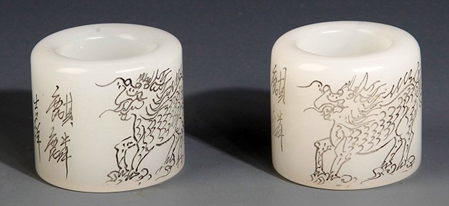 A GROUP OF TWO KIRIN CARVING THUMB RING: Modern, H:1.25in × D:1.0in