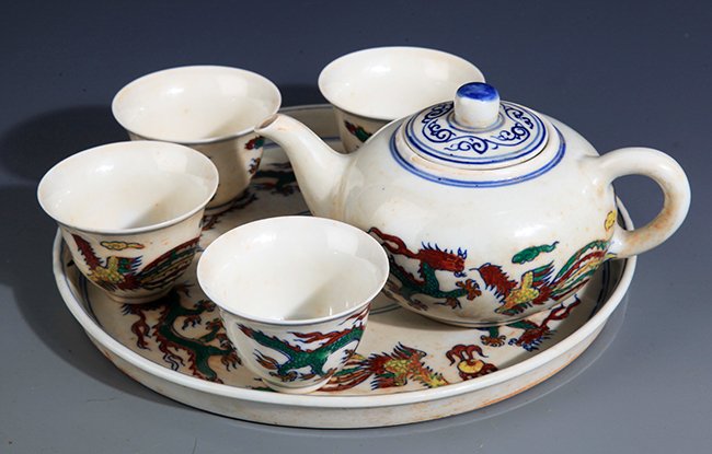 A FINELY PAINTED DOUCAI PORCELAIN TEA SET: Ming Dynasty Cheng Hua Period, Plate D:8.25in; Cup H:1.5in; Tea Pot H:3.4in × L:6.0in
