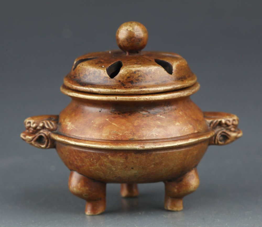 A DOUBLE EAR BRONZE TRIPOD BRONZE CENSER: A DOUBLE EAR BRONZE TRIPOD BRONZE CENSER. Qing Dynasty, Copy of Ming Style, High: 2.6 inch x Diameter: 1.9 inch