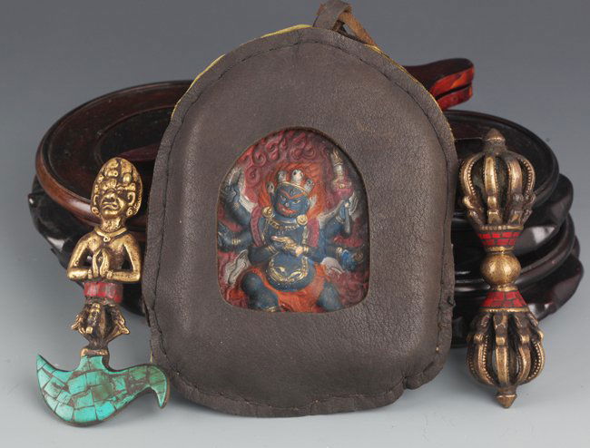 A GROUP OF THREE BRONZE TIBETAN RELIGIOUS OBJECTS (1 of 6)