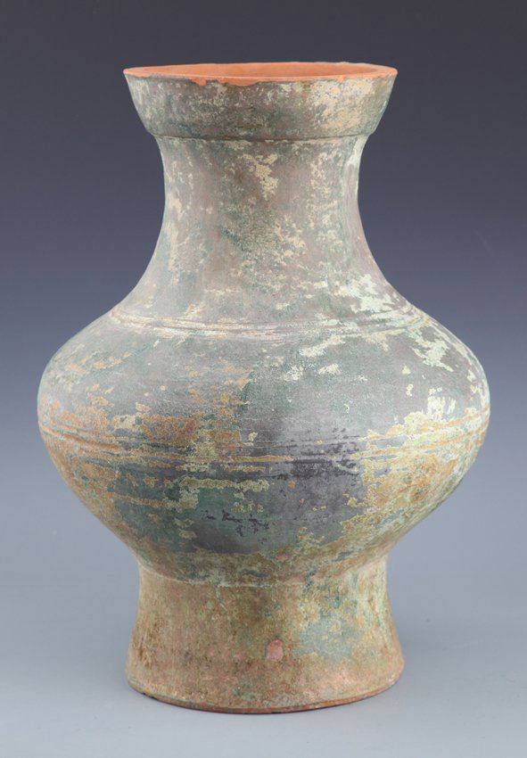 A VERY OLD LIGHT COLOR PORCELAIN JAR (1 of 6)