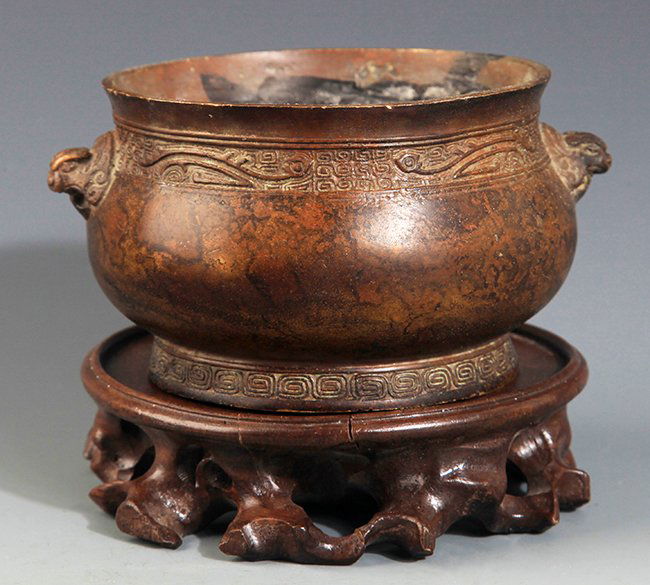 A FINELY CARVED BRONZE CENSER (1 of 4)