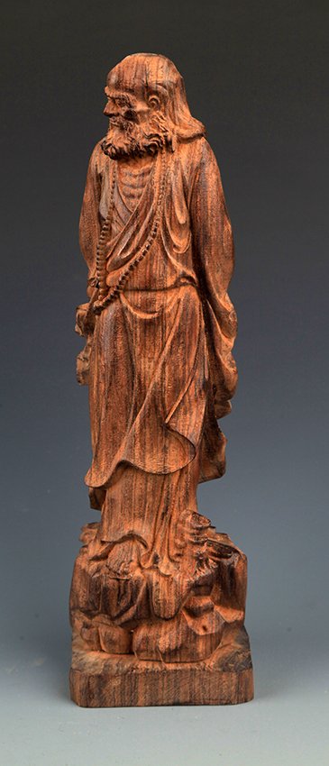 A FINE AGARWOOD SHAPED BODHIDHARMA ROHAN (1 of 8)