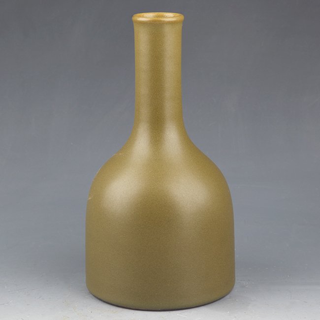 A GREEN TEA COLORED BELL SHAPED BOTTLE (1 of 6)