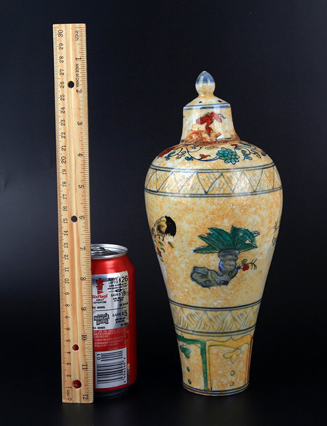 A YELLOW GROUND DOUCAI PORCELAIN WINE JAR: Possibly Ming Dynasty, Cheng Hua,, H:11.00in