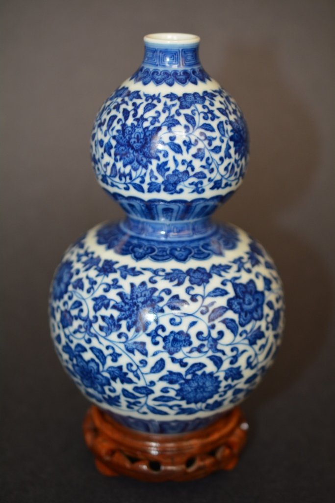 A BLUE AND WHITE DOUBLE-GOURD VASE (1 of 7)
