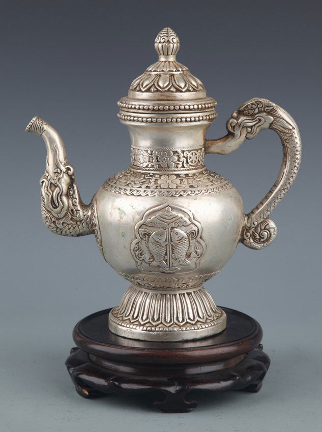 A FINELY CARVED SILVER PLATED TEA POT (1 of 8)