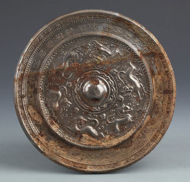 AN OLD FINELY CARVED BRONZE MIRROR (1 of 6)