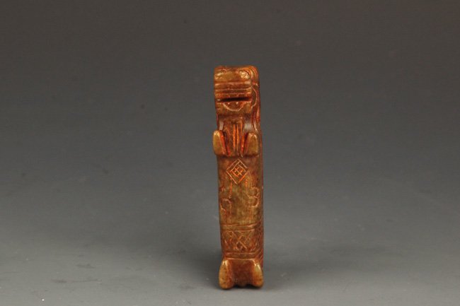 A RARE AND OLD DRAGON SHAPED JADE (1 of 4)