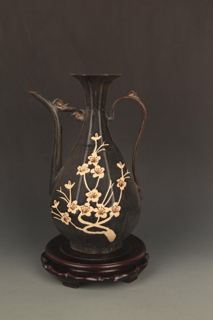 A BLACK GLAZED  "JI YOU YAO " PLUM TREE WATER JAR (1 of 8)
