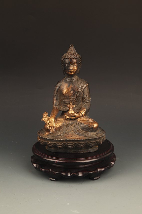 A FINE GILT BRONZE BHAISAJYAGURU BUDDHA: Ming Dynasty, High: 6.0 inch × Width: 4.0 inch