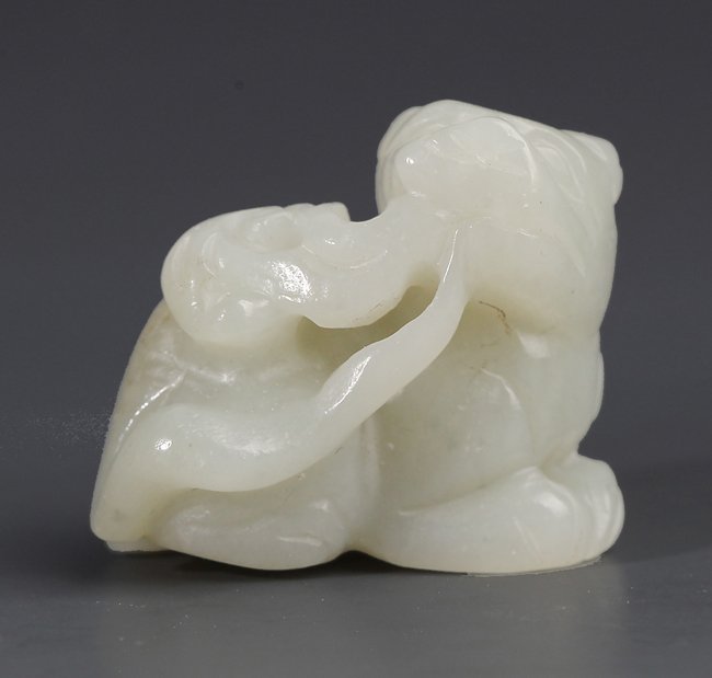 A WHITE JADE "RUI SHOU" WITH GANODERMA LUCIDUM (1 of 4)