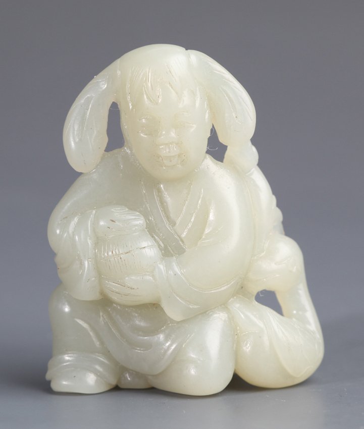 A GREENISH WHITE PLAYING BOY JADE PENDANT (1 of 4)