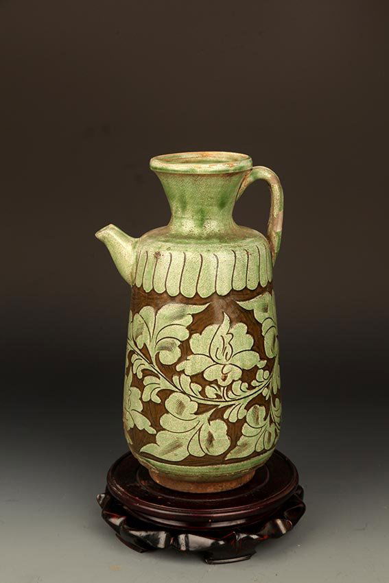 A "CI ZHOU YAO" FLOWER CARVING WATER JAR (1 of 7)