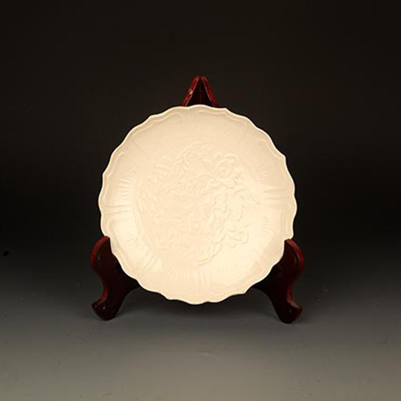 A "DING YAO" WHITE GLAZED LOTUS SHAPE PLATE (1 of 3)