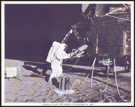 20 NASA Apollo 12 Photographs: 20 NASA Photographs from Apollo 12 A collection of 20 NASA photographs from the Apollo 12 mission, all but one of them taken on the lunar surface. All are in very good condition, and as an extra bonus