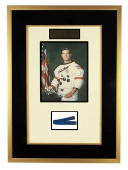 Apollo 15 Strap Used on Lunar Surface w/ Dust: This 12 x 1" blue beta cloth strap bears identification "33100083-301, S/N 1004"and is heavily coated with lunar dust. According to David Scott, it was used by him on the lunar surface during the Apol