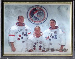 Apollo 15 David Scott Autograph: on a color (8x10") color photograph of the Apollo 15 crew. Minor faults to the photograph on the lower right corner.