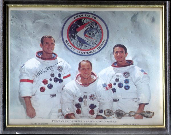 Apollo 15 David Scott Autograph: on a color (8x10") color photograph of the Apollo 15 crew. Minor faults to the photograph on the lower right corner.