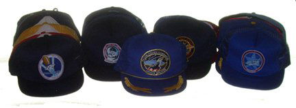 Lot of 35 Shuttle Baseball Hats: A dealers lot of assorted baseball hats bearing Shuttle mission emblems. Included are hats for STS-6, Spacelab 1, ALT, STS 41-G, and more. Some duplication. All are in excellent condition.