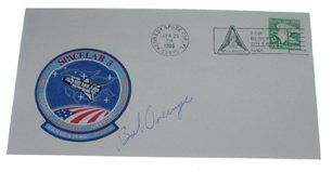 Robert Overmyer Autograph on Spacelab 3 Cover: Robert Overmyer Autograph in blue ink on a Spacelab 3 commemorative cover. The cover bears a color STS 51B mission cachet, and a US "D" eagle postage stamp tied with a KSC cancel dated Apr 29, 1985, a