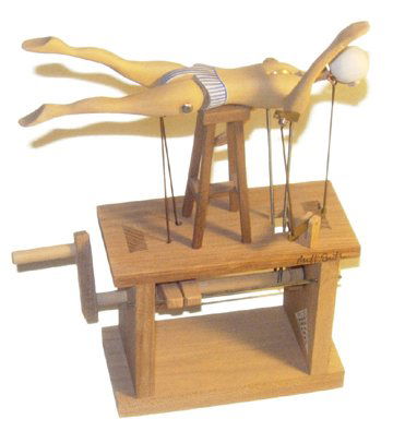 "How to Swim No. 17" Automata: "How to Swim No. 17" Mechanical Automata by Cabaret Mechanical Movement Signed by Matt Smith (6 x 7 x 3") A wooden automata depicting a swimmer lying on top of a chair practicing swimming. Excellent w
