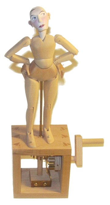 Lady Swaying Hips Automata #9598: Lady with Swaying Hips Mechanical Automata #9598 Signed by Matt Smith(8.5 x 4 x 1.75") A wooden automata of a woman swaing her hips. Excellent condtion.