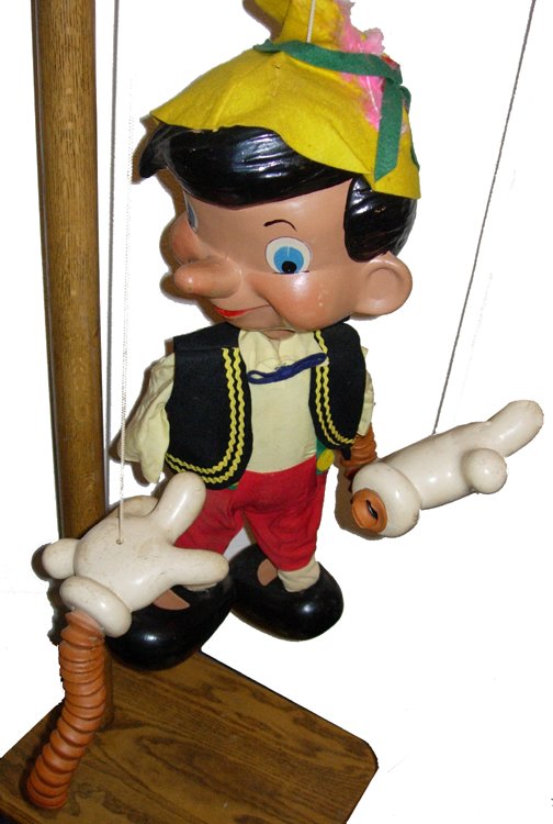 1950 Display Pinocchio Pelham Puppet: Circa 1950's Oversize Store Display Walt Disney Character Pinocchio Marionette by Pelham Puppets (28" tall) complete with 67" solid oak stand. Manufactured in the late 1950's by the Pelham Company in