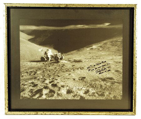 David Scott Apollo 15 Autograph on a pho: David Scott Apollo 15 Autograph on a photograph (15x20") of the Lunar Rover on the Lunar surface. Professionally framed (to 21.5x25.5") in a silver/black wooden frame. Inscribed in black ink "LRV#1 at