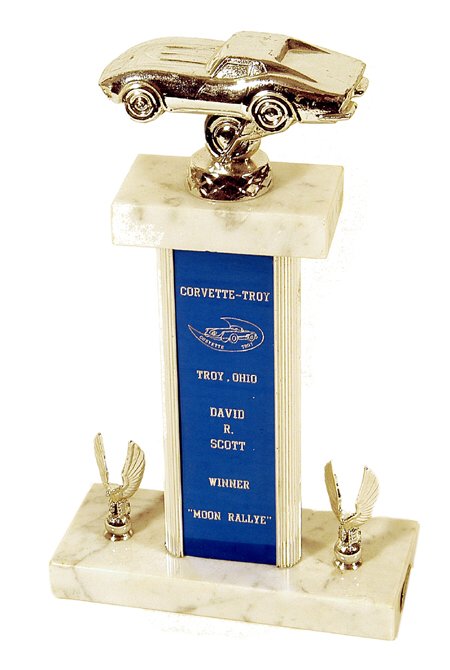 David Scott Apollo 15 Corvette Trophy Si: David Scott Apollo 15 Corvette Trophy Silver toned Corvette atop a trophy which reads "Corvette- for the "Moon Rallye" Troy, Troy Ohio, David R. Scott, Winner, "Moon Rallye". Rectangular white marble