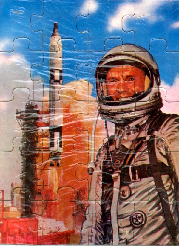 Mercury, "Astronaut" Jigsaw Puzzles: Three wonderful vintage puzzles made in Japan. The first is a picture of John Glenn in front of his rocket, the other two depict two space-walking astronauts. Good condtion.