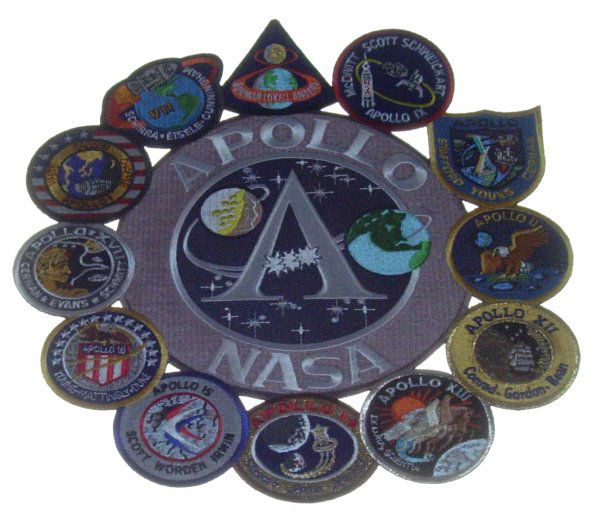 Large Apollo Embroidered Program Patch: (10" dia.) An oversize Apollo program patch. This richly embroidered patch has a central patch (6.75" diameter) with the Apollo program logo. The central patches is surrounded by 12 small mission patc