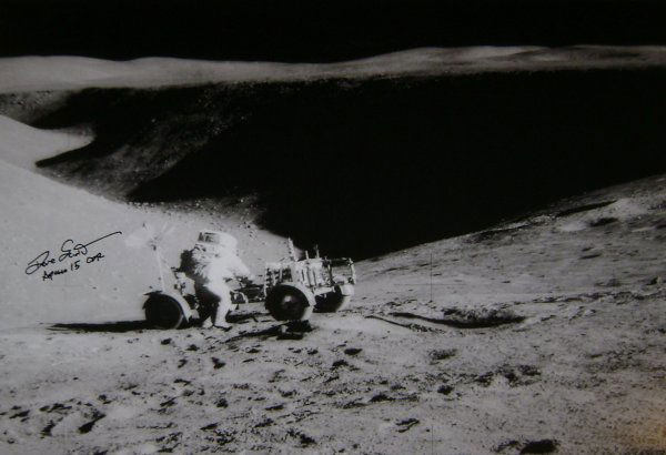 Apollo 15 David Scott Autograph on Lg Lunar Photo: in black Sharpie on a contemporary print of a NASA photograph in large format (16 x 20") of the Apollo 15 Commander on the lunar surface with the LRV. Excellent condition. Perfect for framing.