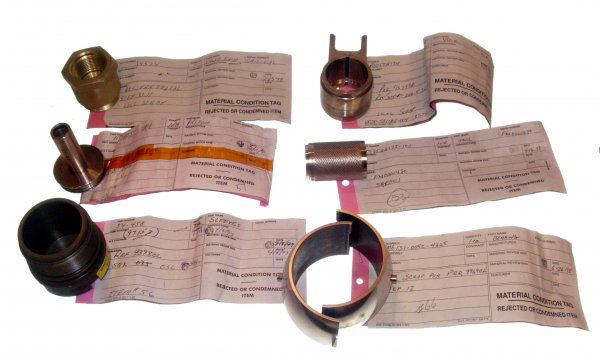 Shuttle STS Ground Support Equipment Spares: (in two parts, 4" dia), knurled tool (2 x 1.5"0, yolk (4 x 2 x 2"), sleeves (2.5 x 2.5"), piston 1.5 x 3"), and valve end (2.5 x 2.5").